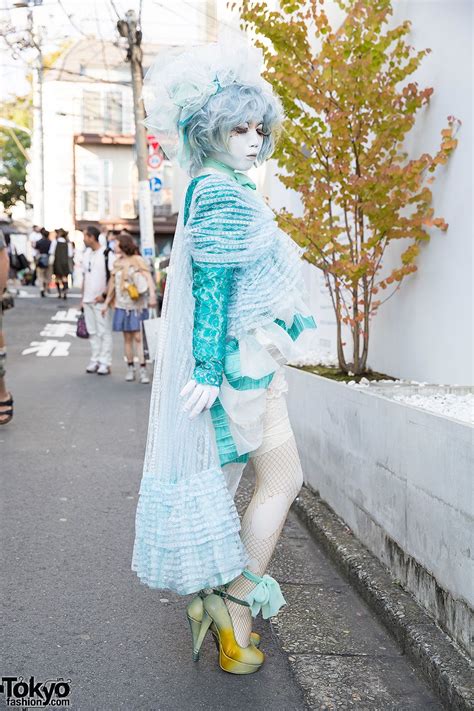 Japanese Shironuri Artist Minori Wearing Baby Blue Lace And Ruffles On