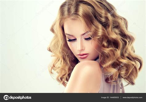 Beautiful Model Girl With Curly Hair Stock Photo By ©edwardderule