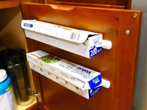 Hang Aluminum Foil And Cling Wrap Inside A Cabinet For Easier Access