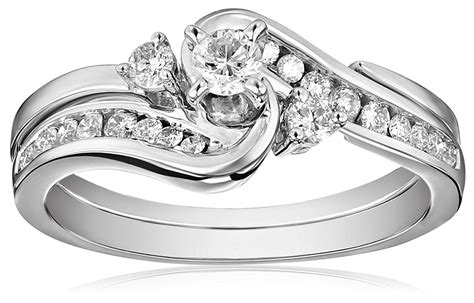 From modern styles to classic designs, our large assortment of wedding ring and bridal sets is carefully curated to help you find your dream engagement ring and its perfect wedding band match. IGI Certified 14k White Gold Interlocking Diamond Bypass ...