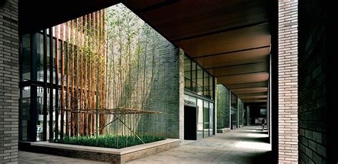 Semi Outdoor Corridor With Atriums That Encourages The Penetration Of