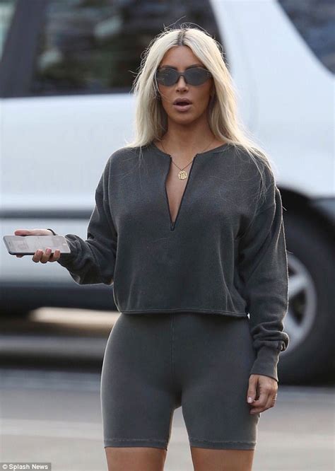 kim kardashian flaunts her figure in six yeezy outfits daily mail online