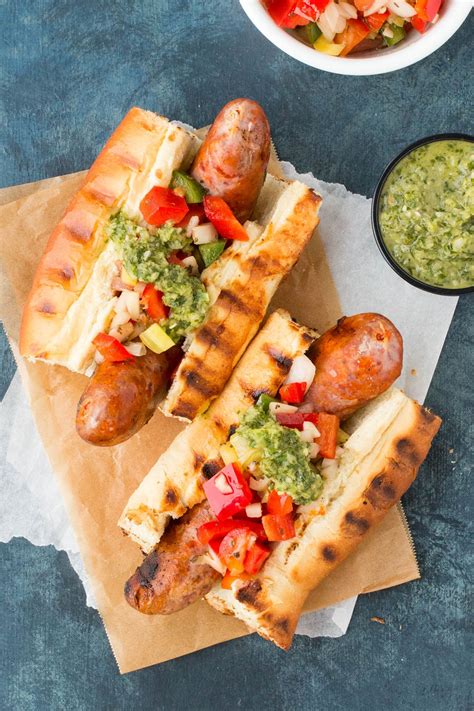 Grilled Chorizo Choripán Argentina With Chimichurri And Salsa Criolla