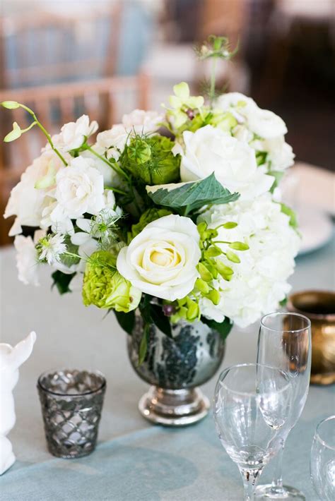Classic White Rose Centerpiece In Mercury Glass Vase