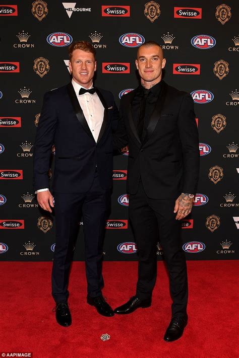 Joshua nicholas caddy is a professional australian rules footballer playing for the richmond football club in the australian football league. Dustin Martin cuts a dapper figure in sharp suit at the ...
