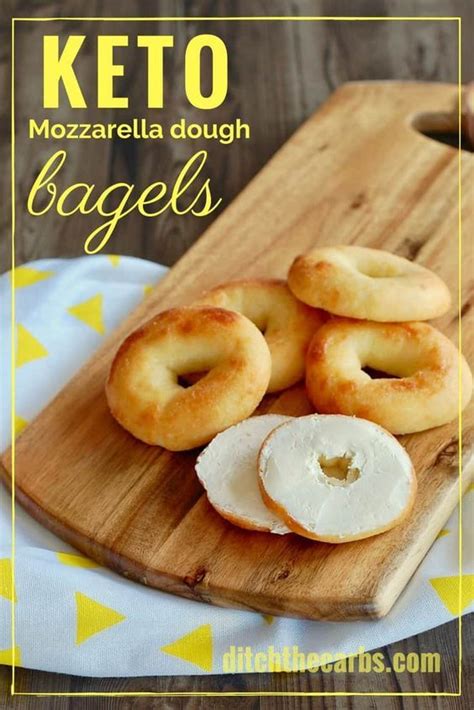 Use the hand of a spoon to press a hole through each dough ball. Easy recipe for Keto mozzarella dough bagels. #lowcarb # ...