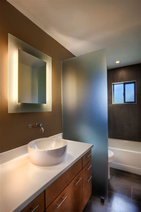 The mirror has a square shape with a thin black frame. Bathroom mirrors - 25 ideas, types and designs for your ...