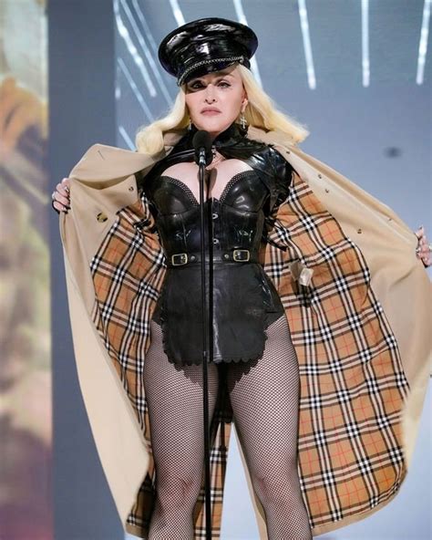 Madonna 63 Turns Heads As She Strips Down To Cleavage Baring Leather