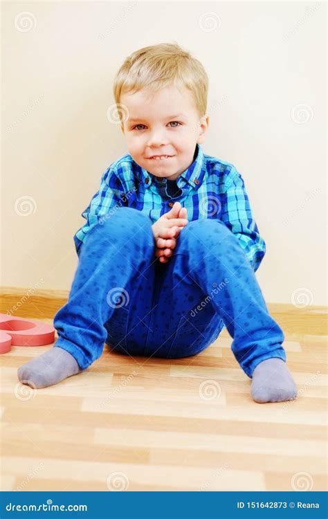 Toddler Boy Sitting On The Floor Stock Image Image Of Happy Looking