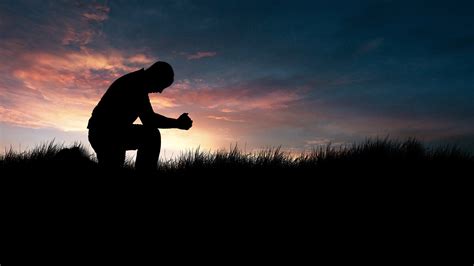 4 26 Ch Silhouette Of Man Kneeling In Prayer In Field At Sunset