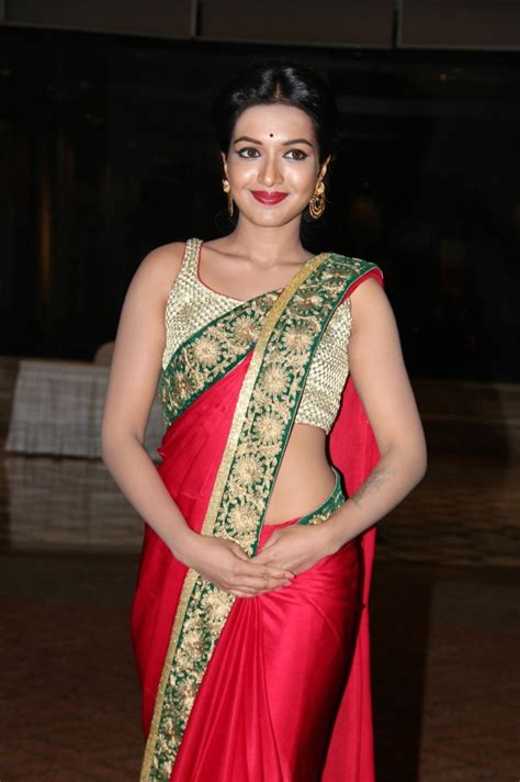 Catherine Tresa In Red Saree At Tamil Movie Madras Audio Launch In