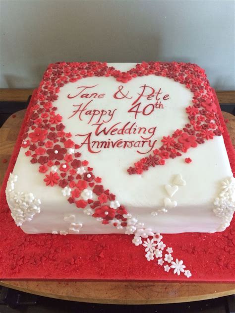 This cake is covered in a smooth buttercream then a stencil was used to add the design. Cake For 40th Wedding Anniversary