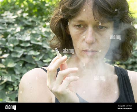 Portrait Of A Smoking Woman Stock Photo Alamy