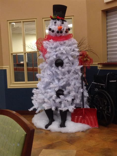 The wide variety of dental office creations is something to behold. Christmas tree decorated like a snowman at my doctors ...