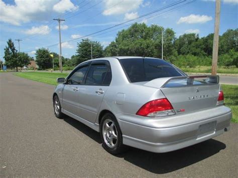 Get vehicle details, wear and tear analyses and local price comparisons. Buy used 2002 Mitsubishi Lancer Oz Rally Edition Stick LOW ...