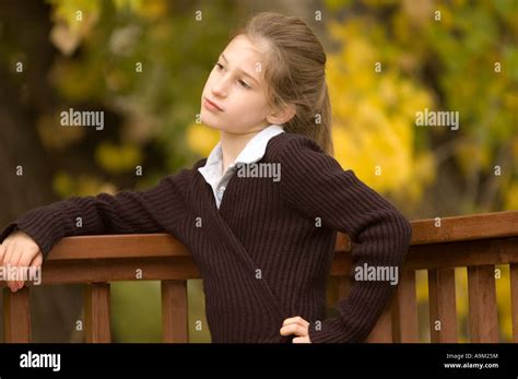 Pre Teen Girl Posing With Fall Leaves Stock Photo Alamy