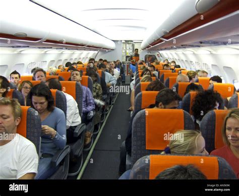 Passengers On An Aeroplane Stock Photo Alamy