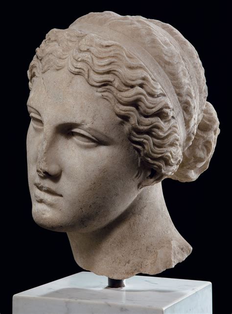 A ROMAN MARBLE HEAD OF APHRODITE CIRCA 1ST 2ND CENTURY A D 1st