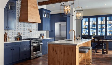 The island doesn't always have to be the showpiece of the kitchen. Two-toned Shaker Kitchen Cabinets to Mix and Match For ...