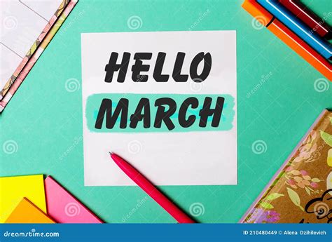 Hello March Written On A Turquoise Background Near Bright Stickers