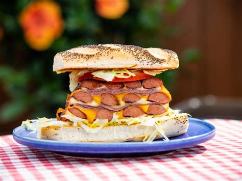 Plate the flat bread topped with frank'skraut next the beans and finally the hot dog. Grilled Triple-Decker Hot Dog Sandwich Recipe | Jeff Mauro ...