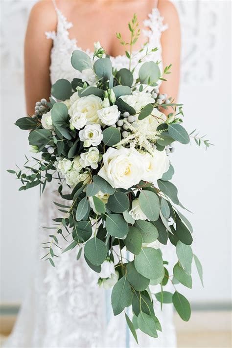 Hottest 7 Spring Wedding Flowers White Roses Cascading Bridal