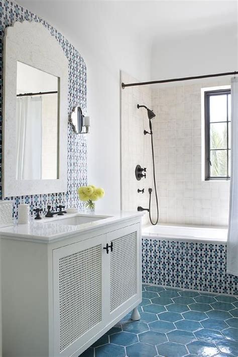 Charming White And Blue Moroccan Style Bathroom Is Equipped With An