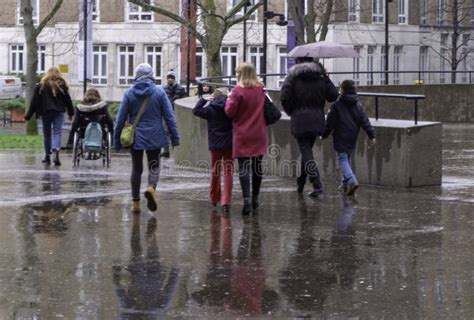 London United Kingdom Feb 19 2020 People Walking In The Rain