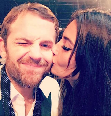 Lily Aldridge Plants A Kiss On Her Husband Caleb Followill Ringing In