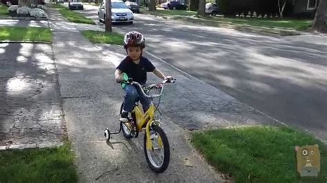 Learning To Ride A Bicycle With Training Wheels Youtube