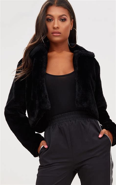 black cropped faux fur coat coats and jackets prettylittlething ie