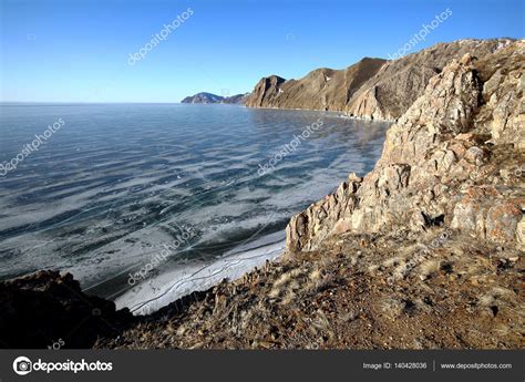 Rocky Shore Of Lake Baikal In Winter — Stock Photo © Vkuz 140428036