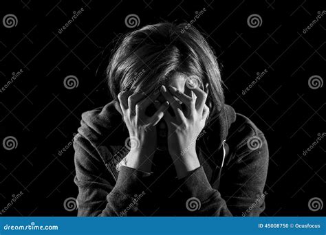 Close Up Woman Suffering Depression And Stress Alone In Pain And Grief