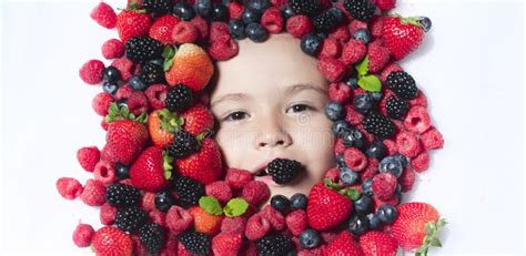 Berrie Set Child Face With Berry Frame Close Up Berries Mix