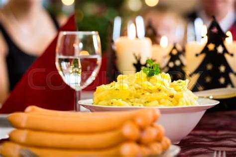These christmas traditions and rituals are quintessentially german. Traditional German Christmas eve dinner ... | Stock image | Colourbox