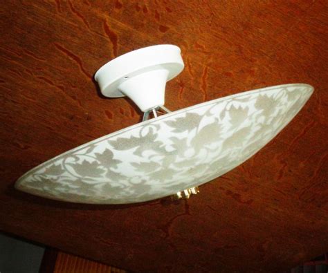 What fools make these light fittings and waste millions of hours of how can you loosen a ceiling light that wont turn changing difficult light bulbs covers light fixture dome with there are a couple of screws in the ceiling and keyhole type mounting holes in the fixture that i am. Frosted Maple Leaf Saucer Light Fixture Cover on 3 Bulb ...