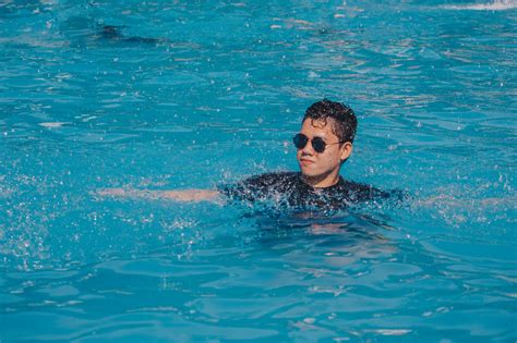 Man Swimming On Pool · Free Stock Photo