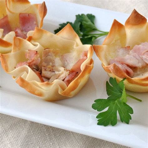 Chicken cordon bleu is usually stuffed with ham and swiss cheese, but you can use any cheese your family likes such as mozzarella or gruyere. Chicken Cordon Bleu Wonton Bites | Kid-Friendly Muffin Tin Recipes | POPSUGAR Family Photo 10