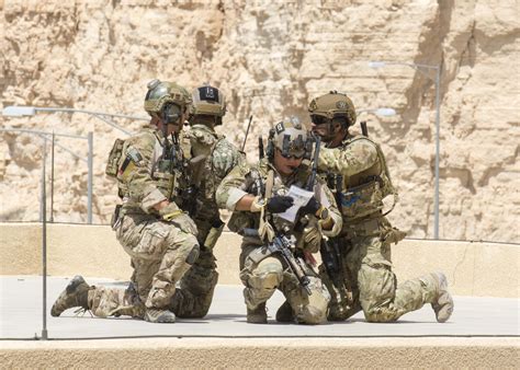 Members Of The Air Force Special Operations And Italian Special Operations Secure A Rooftop