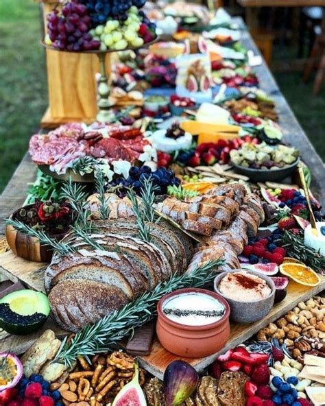 A Long Table Covered With Lots Of Food