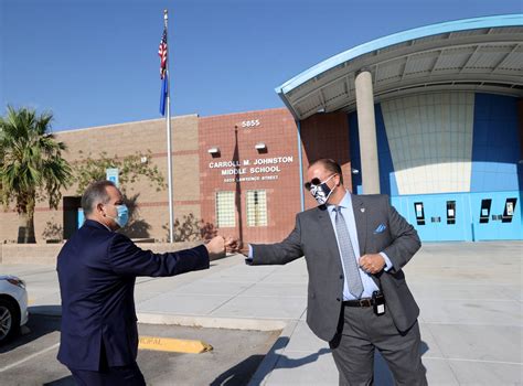 Johnston Middle School Principal Louis Markouzis Right Greets Clark