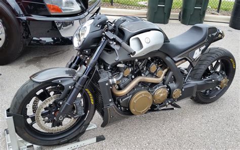 Special shift red paint with flames blacked out rims red pinstripes yellow turn signal bulbs behind clear. Yamaha V-Max by RSD | バイク