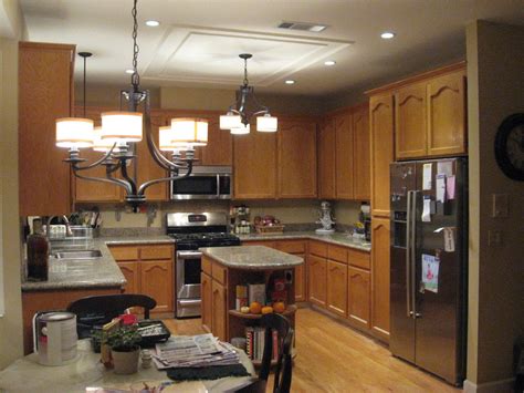I find guides for installing recessed or fluorescent fixtures in suspended ceilings and guide for installing flush mount fixtures in traditional drywall but not flush mount to suspended ceilings. Lighting Existing Ceiling With Kitchen Light Fixtures ...