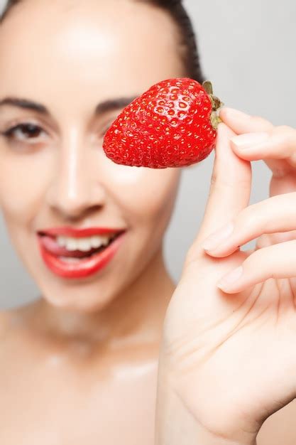 Premium Photo Sexy Woman Eating Strawberry Sensual Lips