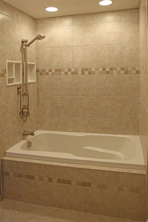 The gold hardware looks luxurious over white tiles. 41 Best Ceramic Tiles for Bathroom Flooring Ideas