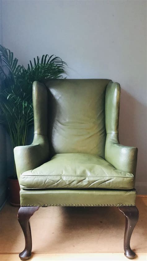 Find your perfect designer armchair at made.com. Green leather wingback armchair, mid century wing armchair ...
