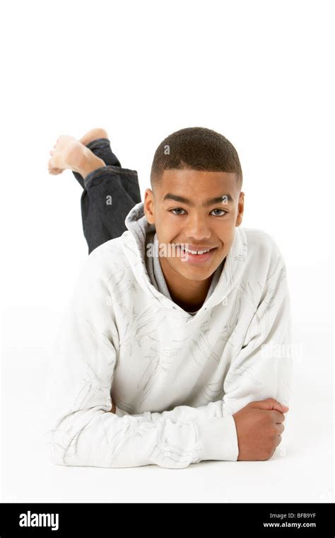 Studio Portrait Of Smiling Teenage Boy Stock Photo Alamy