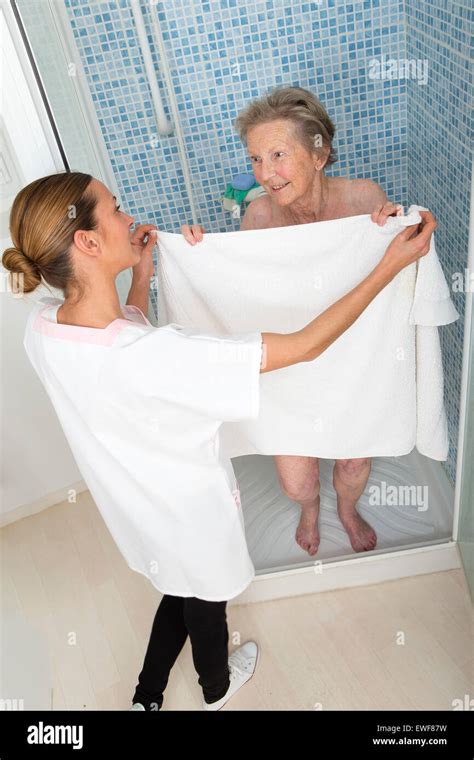 Mature Woman Shower Drying High Resolution Stock Photography And Images