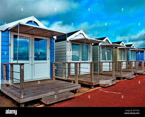 Colourful British Seaside Beach Chalets In A Row Typical Traditional