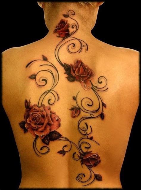 Maybe you would like to learn more about one of these? Cute back floral tattoo | Tatoos | Pinterest